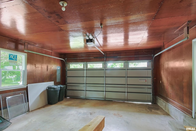 802 W Main St, Vienna, IL 62995 - garage featuring electric panel and a garage door opener