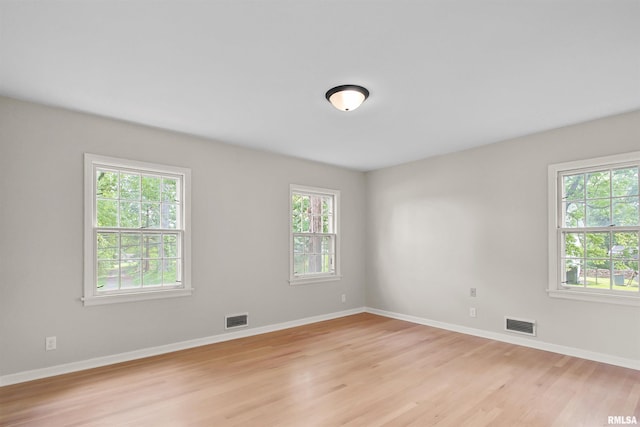802 W Main St, Vienna, IL 62995 - spare room featuring light wood-style floors and baseboards