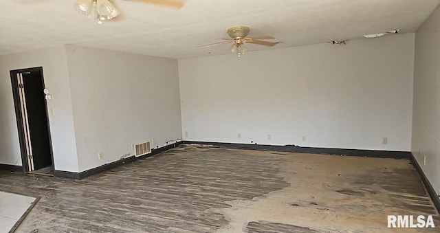 90 Carlock Rd, Murphysboro, IL 62966 - empty room with a ceiling fan, wood finished floors, and baseboards