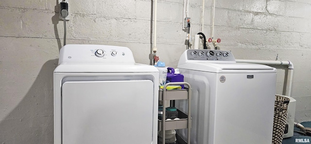 401 E 5th St, Mount Carmel, IL 62863 - clothes washing area with washing machine and clothes dryer and concrete block wall