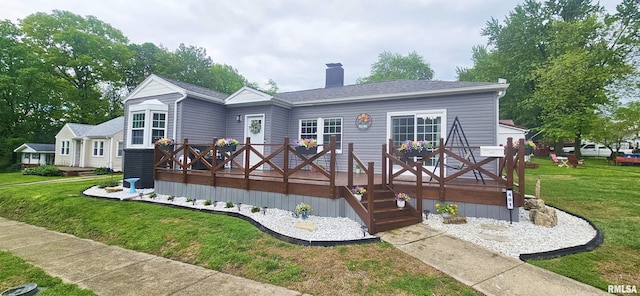 401 E 5th St, Mount Carmel, IL 62863 - rear view of house with a lawn, a chimney, and a deck