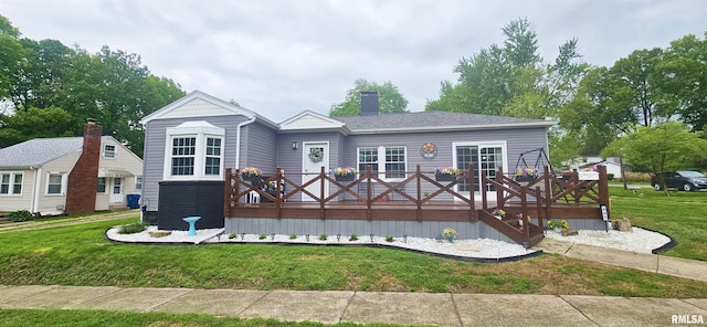 401 E 5th St, Mount Carmel, IL 62863 - back of property with a yard, a deck, and a chimney