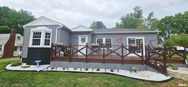 401 E 5th St, Mount Carmel, IL 62863 - back of property with a chimney, a wooden deck, and a yard