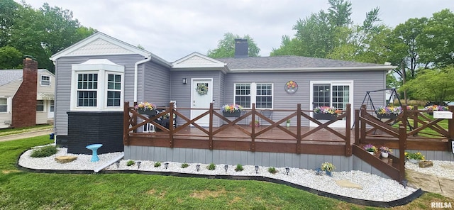 401 E 5th St, Mount Carmel, IL 62863 - back of property with a wooden deck and a chimney