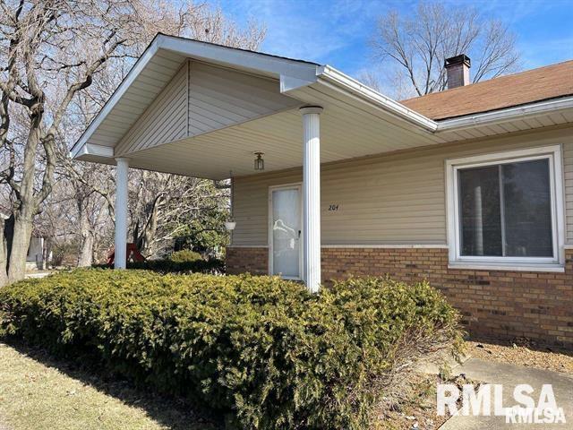 204 W Gelston St, Valier, IL 62891 - entrance to property with brick siding and a chimney