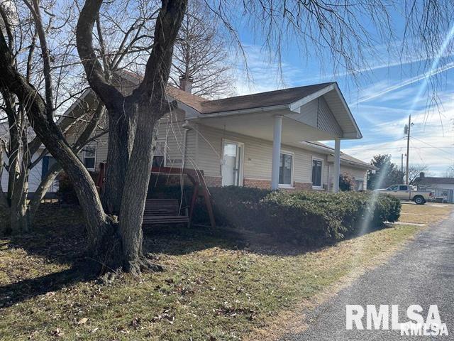 204 W Gelston St, Valier, IL 62891 - view of side of property with a chimney