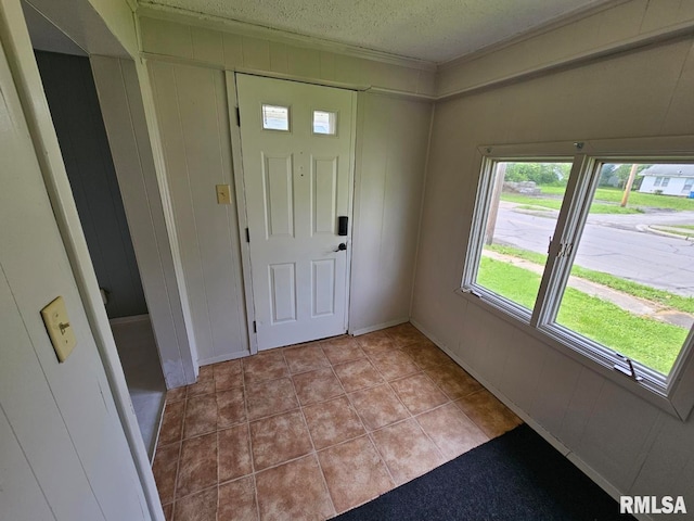 2307 Perkins Ave Unit A, Mount Vernon, IL 62864 - foyer entrance featuring a textured ceiling and light tile patterned floors