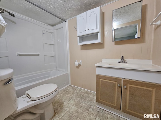 2307 Perkins Ave Unit A, Mount Vernon, IL 62864 - bathroom with toilet, a textured ceiling, vanity, washtub / shower combination, and baseboards