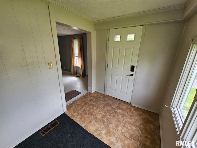 2307 Perkins Ave Unit A, Mount Vernon, IL 62864 - entrance foyer featuring plenty of natural light, crown molding, and light tile patterned floors