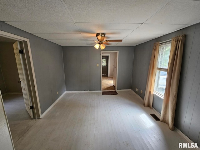 2307 Perkins Ave Unit A, Mount Vernon, IL 62864 - spare room featuring light wood-type flooring, a ceiling fan, and baseboards