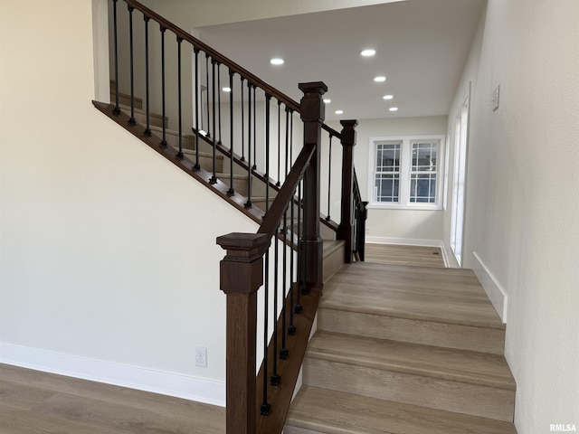 920 E 3rd St, Centralia, IL 62801 - staircase with wood finished floors, baseboards, and recessed lighting
