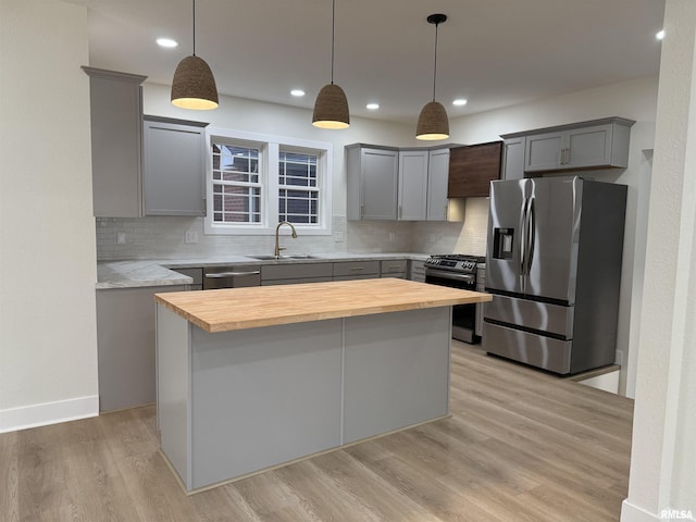 920 E 3rd St, Centralia, IL 62801 - kitchen with appliances with stainless steel finishes, a sink, wooden counters, gray cabinetry, and recessed lighting