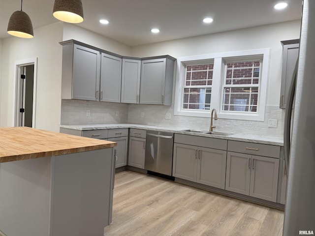 920 E 3rd St, Centralia, IL 62801 - kitchen with stainless steel appliances, gray cabinets, a sink, wood counters, and recessed lighting