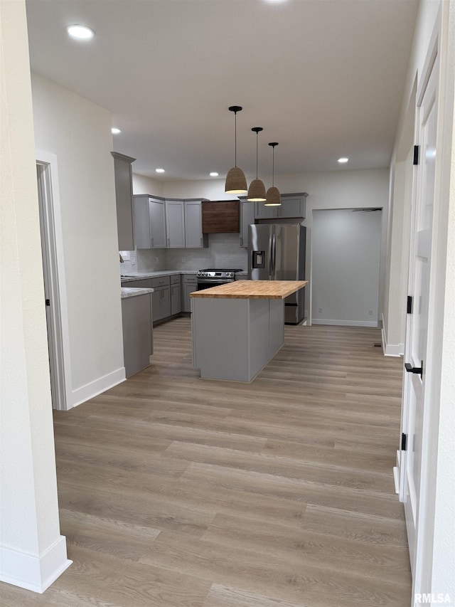 920 E 3rd St, Centralia, IL 62801 - kitchen with butcher block counters, gray cabinets, appliances with stainless steel finishes, recessed lighting, and baseboards