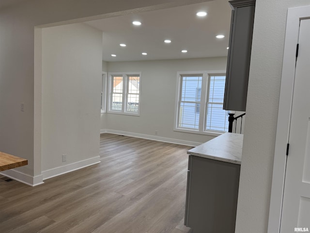 920 E 3rd St, Centralia, IL 62801 - unfurnished dining area with light wood-type flooring, recessed lighting, and baseboards