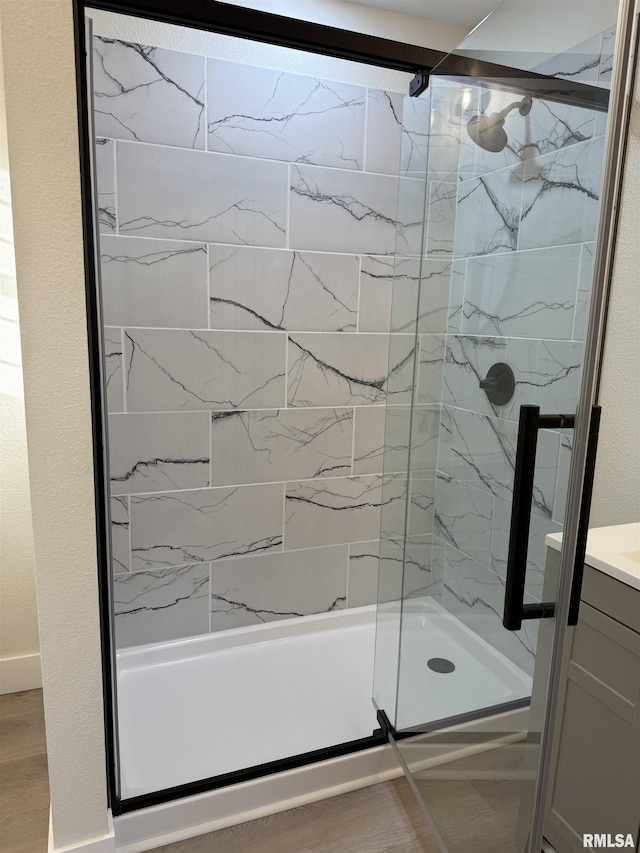 920 E 3rd St, Centralia, IL 62801 - bathroom featuring a marble finish shower and vanity