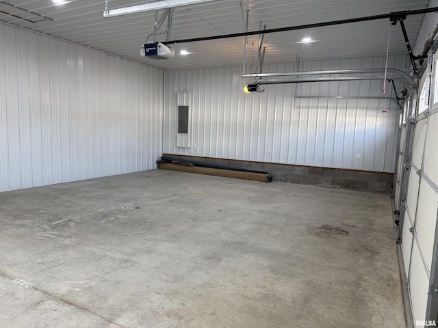 920 E 3rd St, Centralia, IL 62801 - garage featuring a garage door opener and electric panel