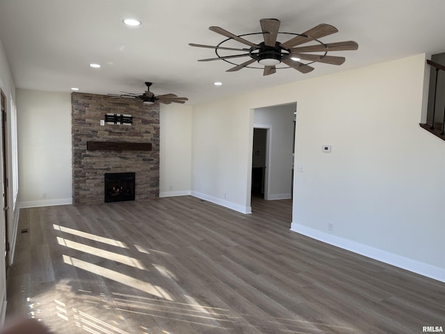 920 E 3rd St, Centralia, IL 62801 - unfurnished living room featuring recessed lighting, wood finished floors, a ceiling fan, a fireplace, and baseboards
