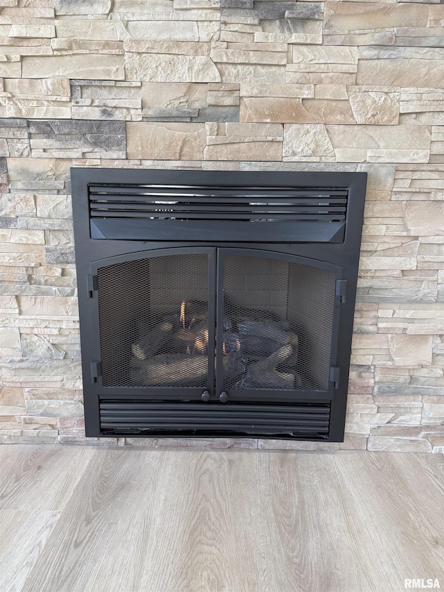 920 E 3rd St, Centralia, IL 62801 - detailed view of a fireplace and wood finished floors