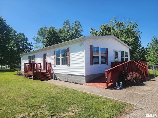 312 Beulah St, Christopher, IL 62822 - view of front facade with a deck, a front yard, and crawl space