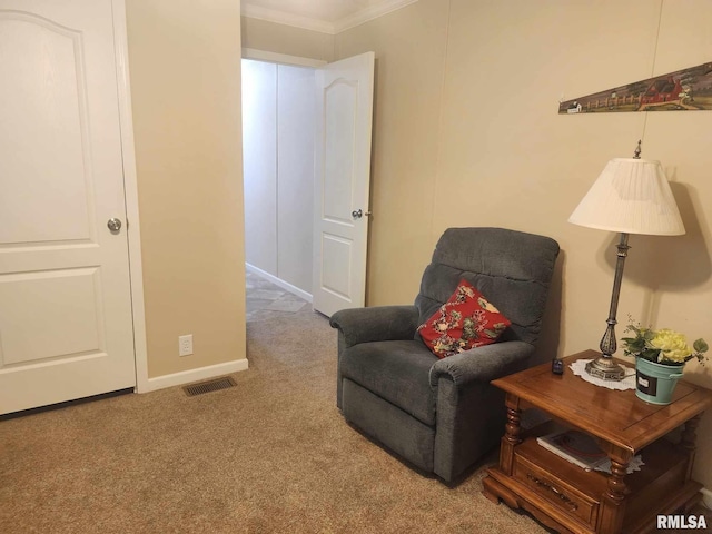 312 Beulah St, Christopher, IL 62822 - sitting room featuring carpet flooring, crown molding, and baseboards