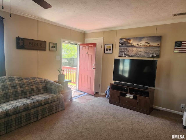 312 Beulah St, Christopher, IL 62822 - living room with ornamental molding, carpet floors, baseboards, a textured ceiling, and ceiling fan