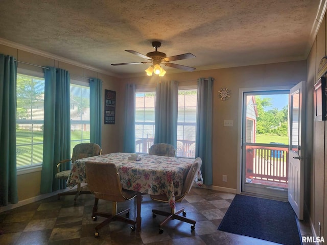 312 Beulah St, Christopher, IL 62822 - dining area with crown molding, baseboards, a textured ceiling, tile patterned floors, and a ceiling fan