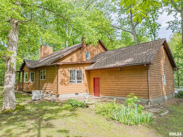 15751 E Tolle Rd, Mount Vernon, IL 62864 - rear view of property with a chimney, roof with shingles, central AC unit, and crawl space