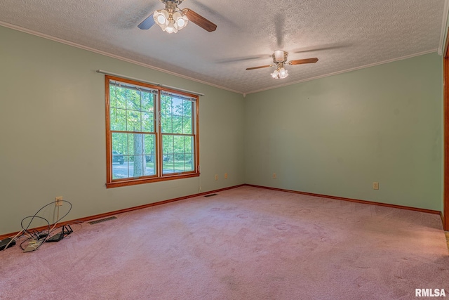 15751 E Tolle Rd, Mount Vernon, IL 62864 - spare room featuring a ceiling fan, carpet flooring, a textured ceiling, crown molding, and baseboards