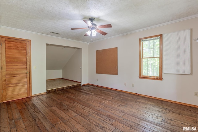 15751 E Tolle Rd, Mount Vernon, IL 62864 - spare room featuring hardwood / wood-style flooring, a textured ceiling, ceiling fan, ornamental molding, and baseboards