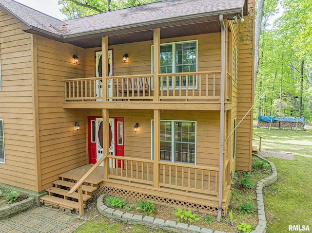 15751 E Tolle Rd, Mount Vernon, IL 62864 - back of property featuring a balcony, a yard, and roof with shingles