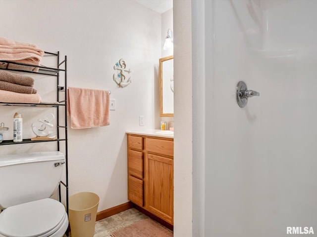 2234 Cascade Ln, Centralia, IL 62801 - bathroom with a shower, vanity, toilet, and baseboards