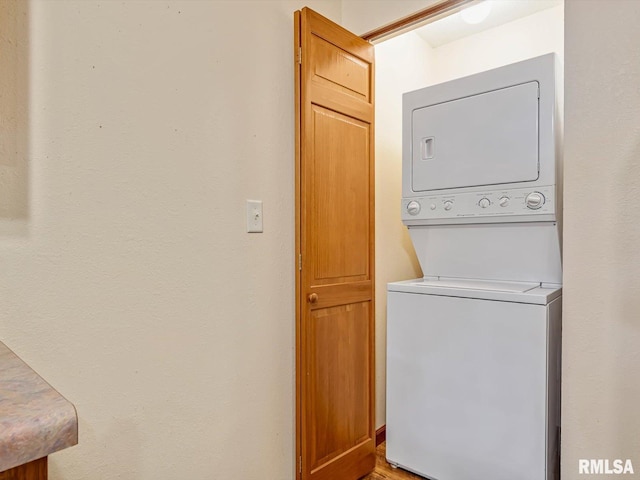 2234 Cascade Ln, Centralia, IL 62801 - clothes washing area featuring stacked washing machine and dryer