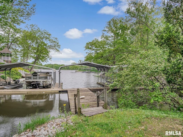 2234 Cascade Ln, Centralia, IL 62801 - dock area featuring boat lift and a water view