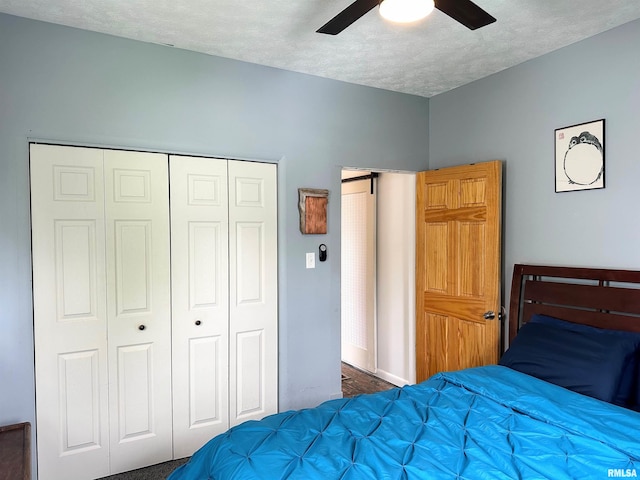 401 S 1st St, Marion, IL 62959 - bedroom with a closet, a textured ceiling, wood finished floors, and a ceiling fan