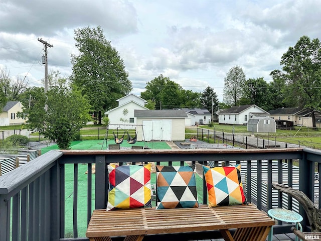 401 S 1st St, Marion, IL 62959 - wooden deck with a shed, an outbuilding, and a residential view