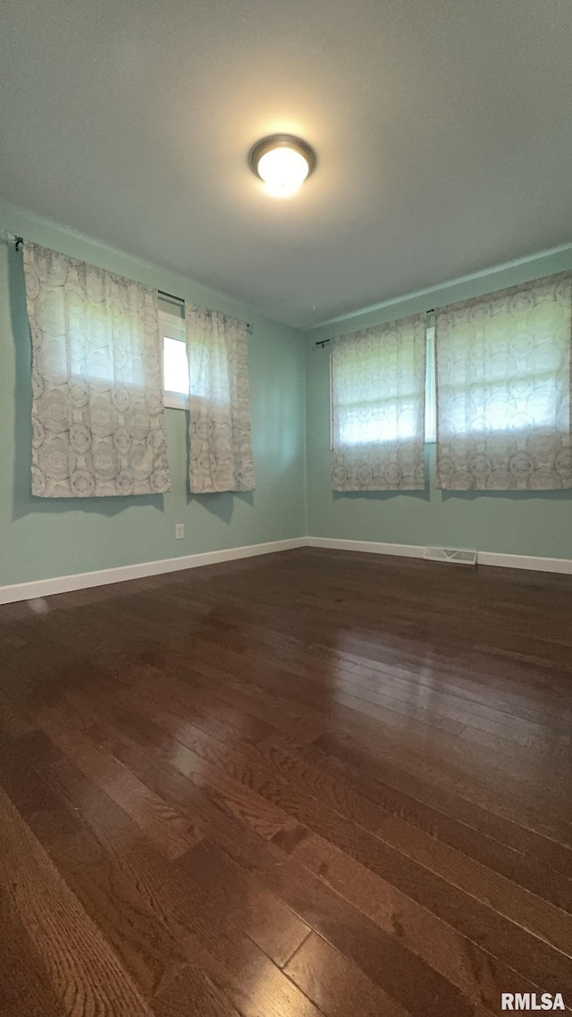 112 Prairie Rd, Carterville, IL 62918 - spare room featuring hardwood / wood-style floors and baseboards