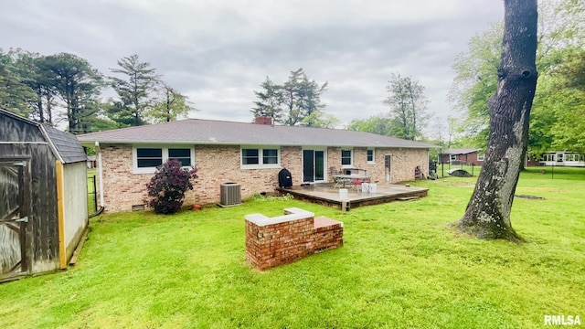 112 Prairie Rd, Carterville, IL 62918 - rear view of house featuring brick siding, a storage shed, a yard, a wooden deck, and an outdoor structure