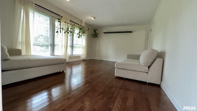 112 Prairie Rd, Carterville, IL 62918 - bedroom featuring multiple windows, dark wood-type flooring, and baseboards