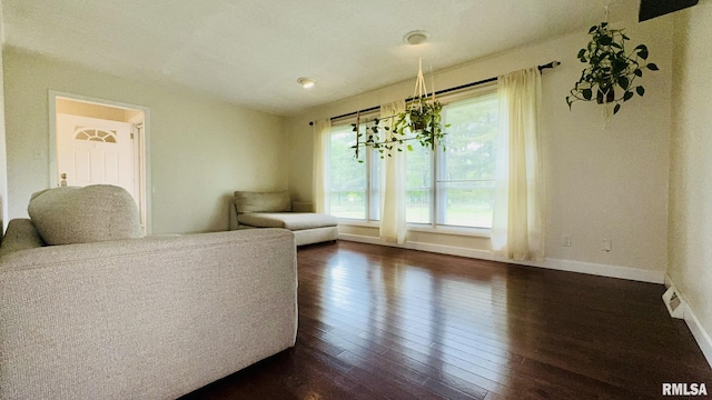 112 Prairie Rd, Carterville, IL 62918 - living area featuring dark wood finished floors and baseboards