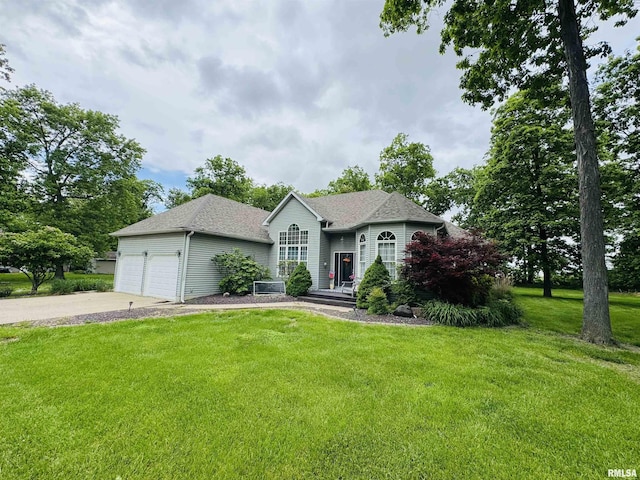 3621 Andrews Ct, Salem, IL 62881 - view of front of home with a front yard, driveway, a garage, and a shingled roof