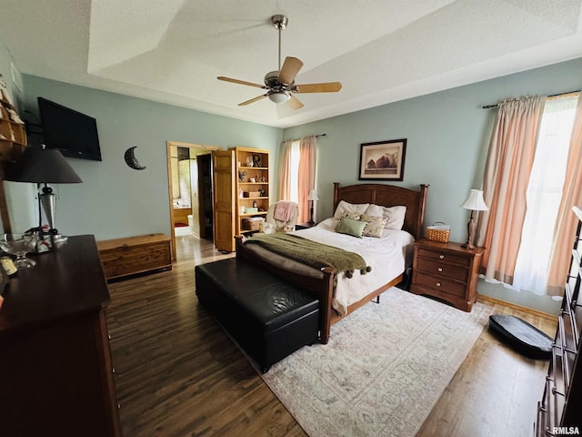 3621 Andrews Ct, Salem, IL 62881 - bedroom featuring wood finished floors, a raised ceiling, and ceiling fan