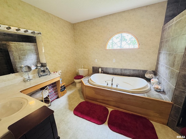 3621 Andrews Ct, Salem, IL 62881 - bathroom featuring a garden tub, vanity, and tile patterned floors