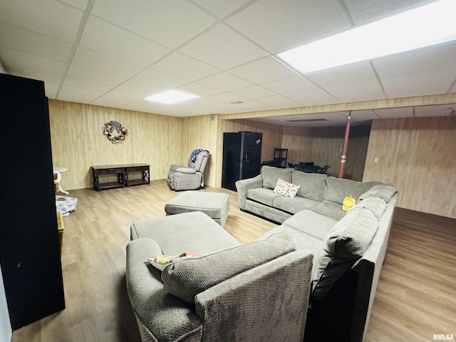 3621 Andrews Ct, Salem, IL 62881 - living area with a drop ceiling, wood walls, and wood finished floors