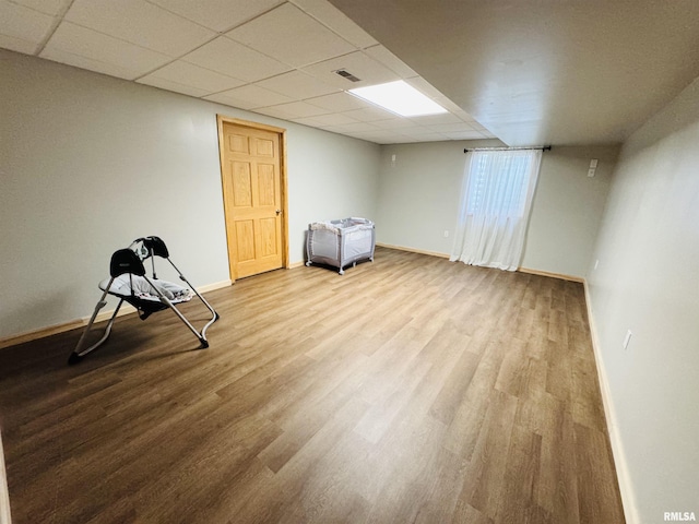 3621 Andrews Ct, Salem, IL 62881 - finished below grade area featuring wood finished floors, baseboards, and a drop ceiling