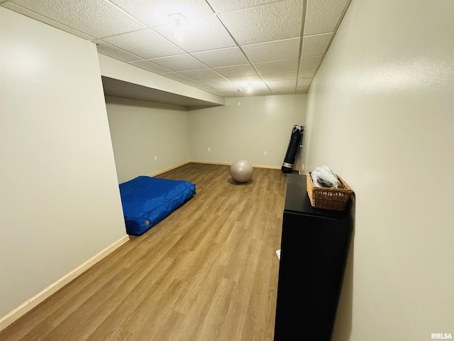 3621 Andrews Ct, Salem, IL 62881 - unfurnished bedroom with wood finished floors, baseboards, and a drop ceiling