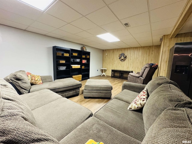 3621 Andrews Ct, Salem, IL 62881 - living area with wooden walls, wood finished floors, and a paneled ceiling