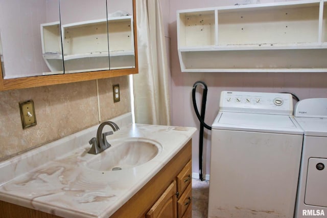 207 Butler St, Metropolis, IL 62960 - clothes washing area with a sink and washing machine and dryer
