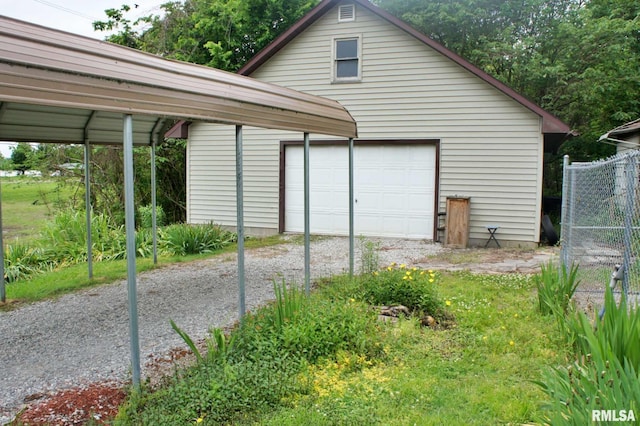 207 Butler St, Metropolis, IL 62960 - detached garage with driveway and fence