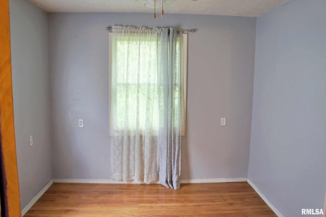207 Butler St, Metropolis, IL 62960 - spare room with light wood finished floors and baseboards